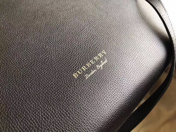 B**rry the medium banner in leather and house check