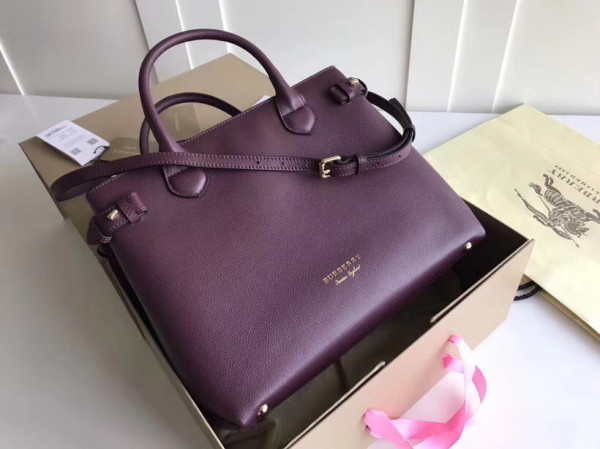 B**rry the medium banner in leather and house check