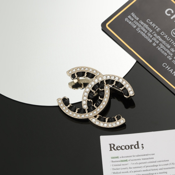 CL BROOCH